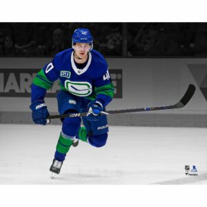 Elias Pettersson Vancouver Canucks Unsigned Blue Alternate Jersey Skating Spotlight Photograph