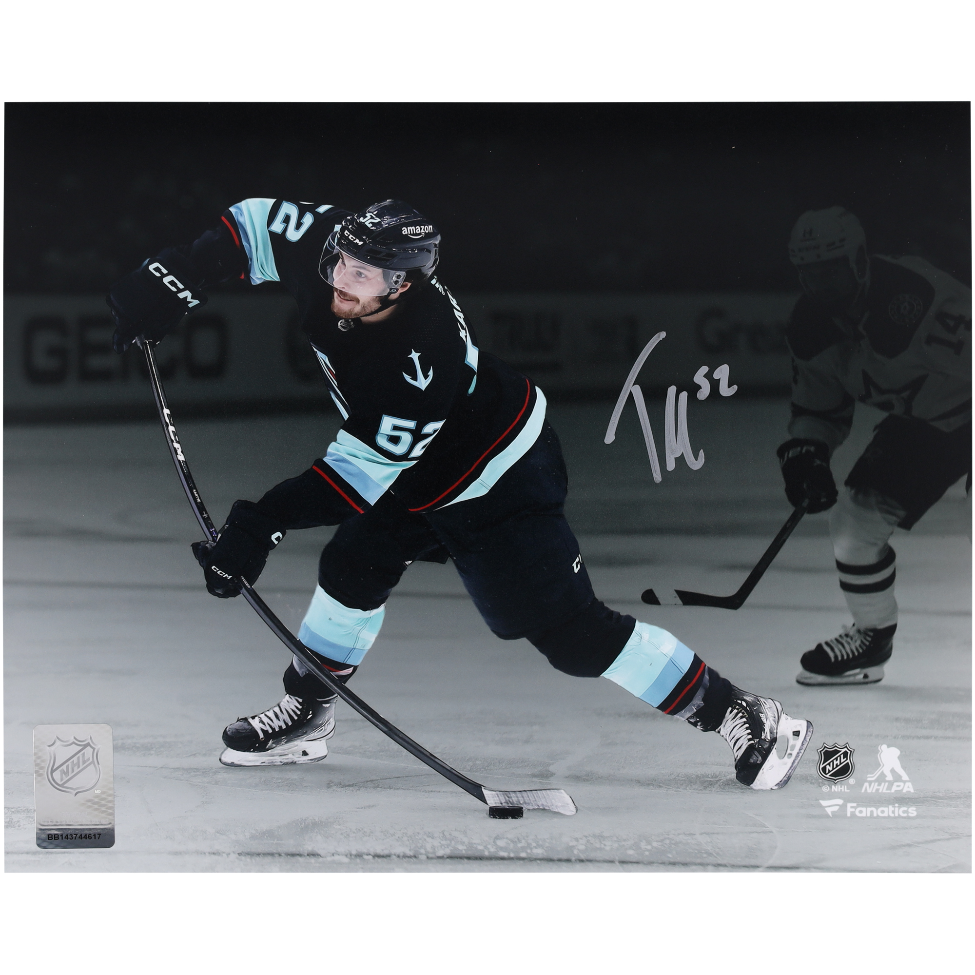 Tye Kartye Seattle Kraken Autographed 8" x 10" Deep Sea Blue Jersey Shooting Photograph