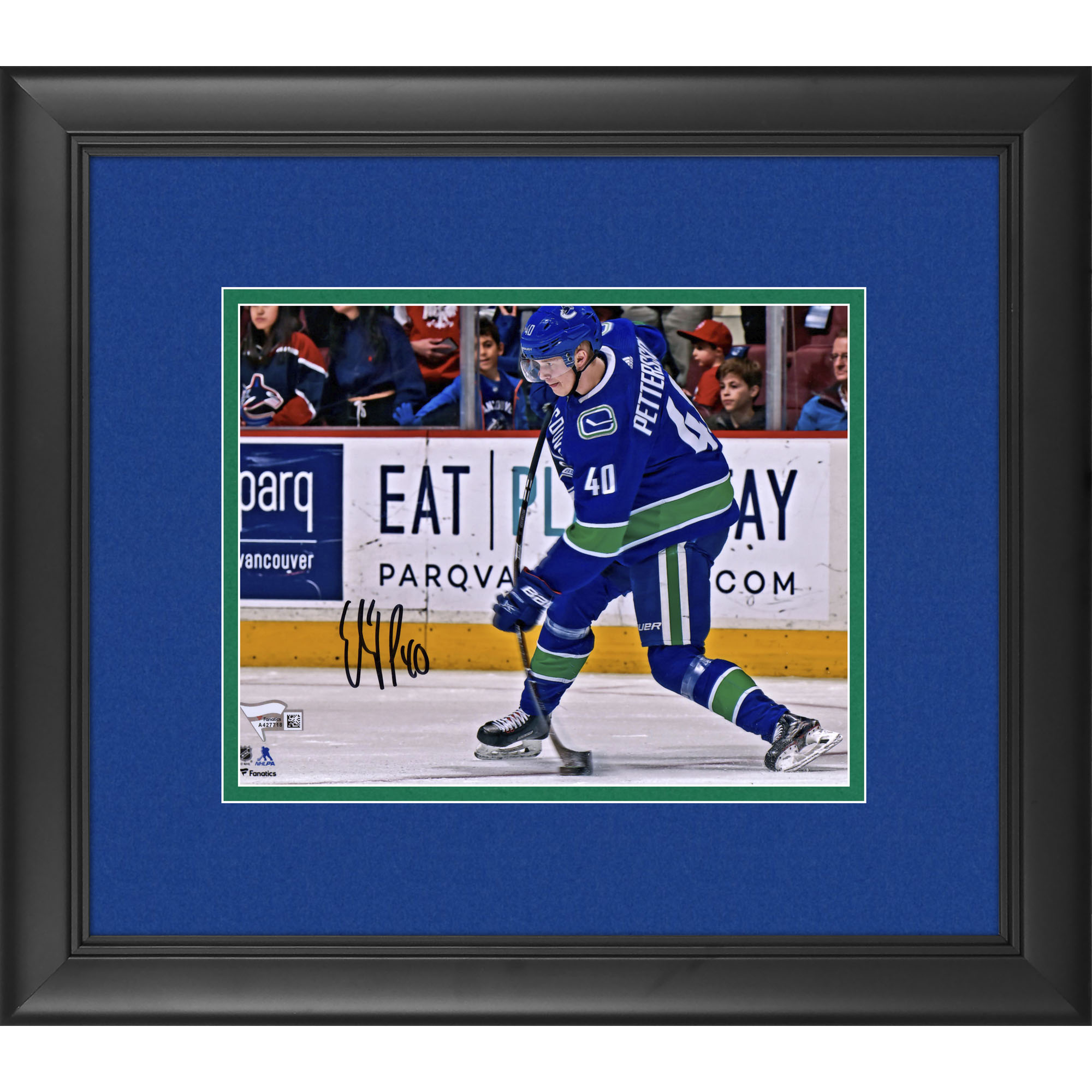 Elias Pettersson Vancouver Canucks Framed Autographed 8" x 10" Blue Jersey Shooting Photograph