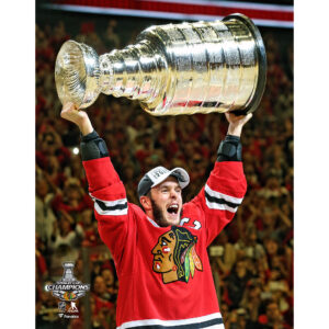 Jonathan Toews Chicago Blackhawks Unsigned 2015 Stanley Cup Champions Raising Cup Photograph